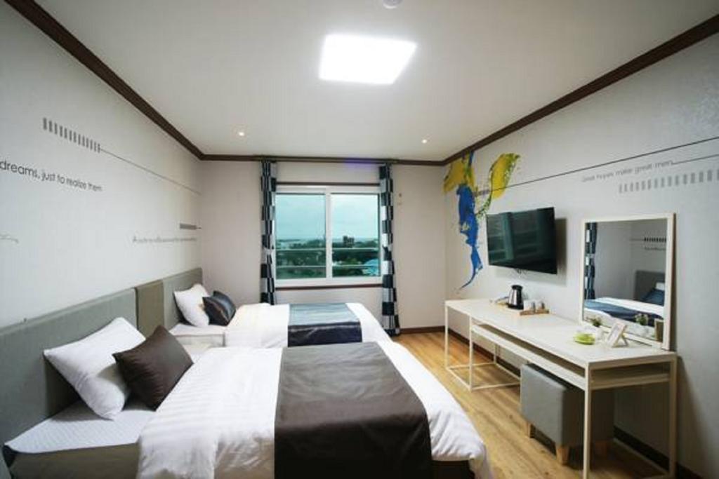 Seongsan Aqua Beach Hotel Seogwipo Habitación foto