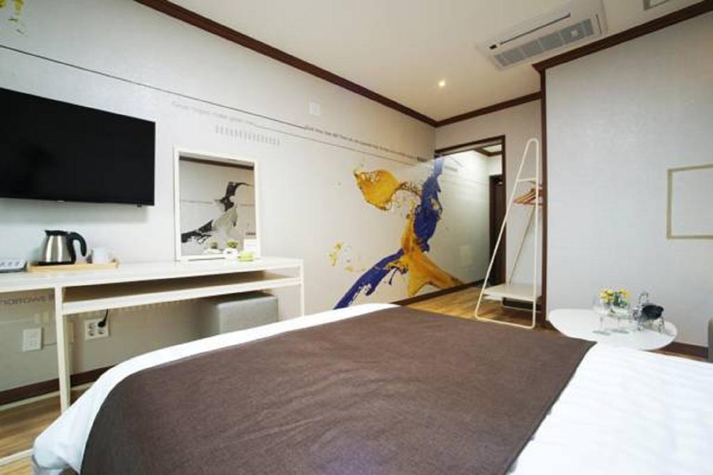 Seongsan Aqua Beach Hotel Seogwipo Habitación foto