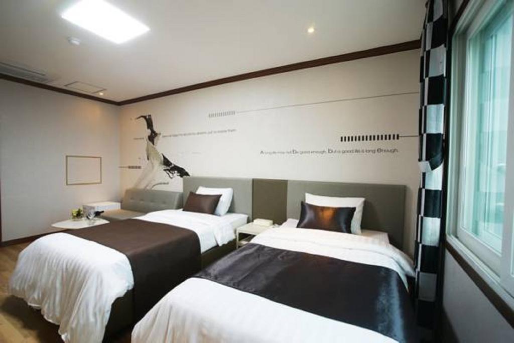 Seongsan Aqua Beach Hotel Seogwipo Habitación foto